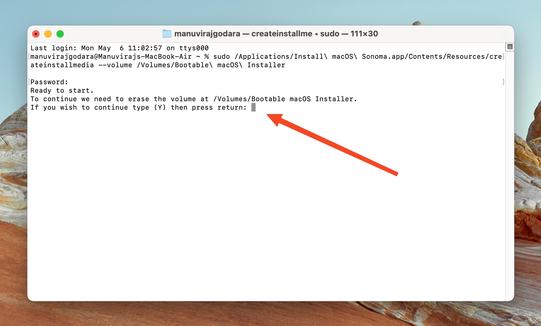 Terminal window on a Mac showing a command to create a bootable macOS installer, with a prompt asking for confirmation to erase the volume.